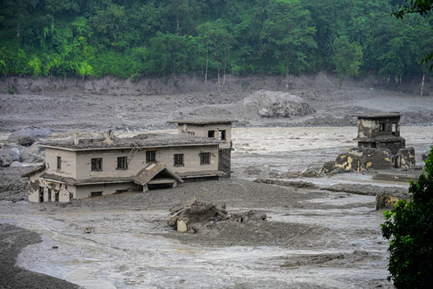 August 26, 2026, Kathmandu, Bagmati, Nepal: NUWAKOT, NEPAL - AUGUST 26: An aftermath view of flash floods and mudslides along the Trishuli River in Nuwakot, Nepal, on August 26, 2026. A catastrophic flash flood swept through Nepalâ€⠢s northern border region after an ice-and-rock avalanche, reportedly triggered by an earthquake, caused a sudden surge in the Lhende River on the Nepal-China border and sent massive volumes of water, mud and debris downstream into the Bhote Koshi and Trishuli river systems. The disaster devastated settlements in Rasuwa and Nuwakot districts, sweeping away homes, roads, bridges, vehicles and other infrastructure and severely damaging hydropower and power facilities. In Nuwakot, riverside settlements includin - ZUMAs330 20260826_zsp_s330_003 Copyright: xSafalxPrakashxShresthax