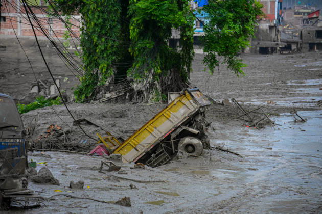 August 26, 2026, Kathmandu, Bagmati, Nepal: NUWAKOT, NEPAL - AUGUST 26: An aftermath view of flash floods and mudslides along the Trishuli River in Nuwakot, Nepal, on August 26, 2026. A catastrophic flash flood swept through Nepalâ€⠢s northern border region after an ice-and-rock avalanche, reportedly triggered by an earthquake, caused a sudden surge in the Lhende River on the Nepal-China border and sent massive volumes of water, mud and debris downstream into the Bhote Koshi and Trishuli river systems. The disaster devastated settlements in Rasuwa and Nuwakot districts, sweeping away homes, roads, bridges, vehicles and other infrastructure and severely damaging hydropower and power facilities. In Nuwakot, riverside settlements includin - ZUMAs330 20260826_zsp_s330_017 Copyright: xSafalxPrakashxShresthax