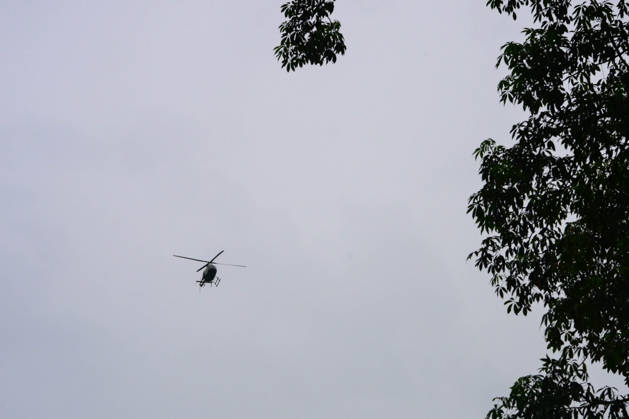 August 26, 2026, Kathmandu, Bagmati, Nepal: NUWAKOT, NEPAL - AUGUST 26: A helicopter conducts rescue operations over areas affected by flash floods and mudslides along the Trishuli River in Nuwakot, Nepal, on August 26, 2026. A catastrophic flash flood swept through Nepalâ€⠢s northern border region after an ice-and-rock avalanche caused a sudden surge in the Lhende River near the Nepal-China border, sending massive volumes of water, mud and debris downstream into the Bhote Koshi and Trishuli river systems. The disaster devastated settlements in Rasuwa and Nuwakot districts, sweeping away homes, roads, bridges, vehicles and other infrastructure and severely damaging hydropower and power facilities. In Nuwakot, riverside settlements incl - ZUMAs330 20260826_zsp_s330_011 Copyright: xSafalxPrakashxShresthax