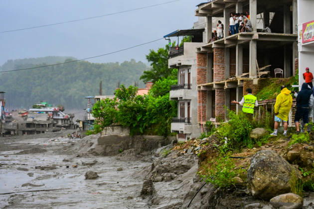 August 26, 2026, Kathmandu, Bagmati, Nepal: NUWAKOT, NEPAL - AUGUST 26: An aftermath view of flash floods and mudslides along the Trishuli River in Nuwakot, Nepal, on August 26, 2026. A catastrophic flash flood swept through Nepalâ€⠢s northern border region after an ice-and-rock avalanche, reportedly triggered by an earthquake, caused a sudden surge in the Lhende River on the Nepal-China border and sent massive volumes of water, mud and debris downstream into the Bhote Koshi and Trishuli river systems. The disaster devastated settlements in Rasuwa and Nuwakot districts, sweeping away homes, roads, bridges, vehicles and other infrastructure and severely damaging hydropower and power facilities. In Nuwakot, riverside settlements includin - ZUMAs330 20260826_zsp_s330_056 Copyright: xSafalxPrakashxShresthax