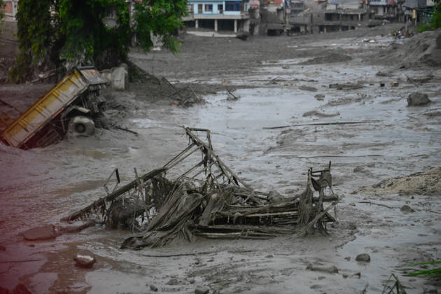 August 26, 2026, Kathmandu, Bagmati, Nepal: NUWAKOT, NEPAL - AUGUST 26: An aftermath view of flash floods and mudslides along the Trishuli River in Nuwakot, Nepal, on August 26, 2026. A catastrophic flash flood swept through Nepalâ€⠢s northern border region after an ice-and-rock avalanche, reportedly triggered by an earthquake, caused a sudden surge in the Lhende River on the Nepal-China border and sent massive volumes of water, mud and debris downstream into the Bhote Koshi and Trishuli river systems. The disaster devastated settlements in Rasuwa and Nuwakot districts, sweeping away homes, roads, bridges, vehicles and other infrastructure and severely damaging hydropower and power facilities. In Nuwakot, riverside settlements includin - ZUMAs330 20260826_zsp_s330_057 Copyright: xSafalxPrakashxShresthax