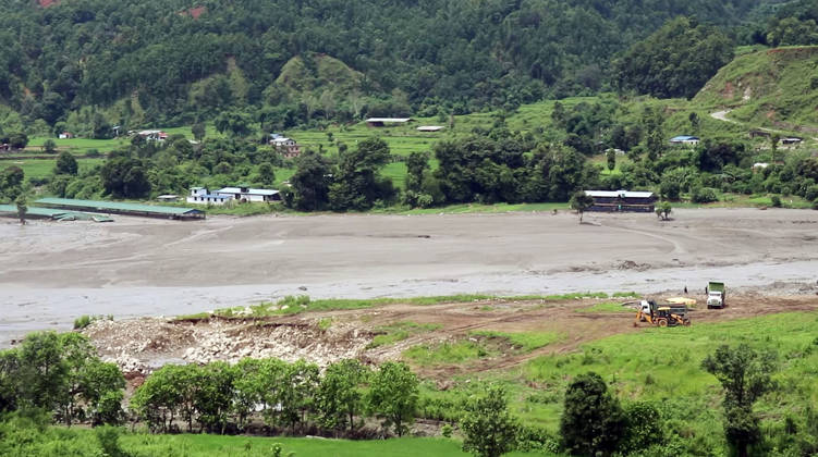 RECORD DATE NOT STATED Flash flood ravages Nepal™s Rasuwa Rasuwa Nepal , Aug 26 (ANI): A view of an area damaged by a mud-laden flash flood following an outburst in the Bhotekoshi River, in Rasuwa on Wednesday. Around 105 Indians among the foreign nationals reported missing after the flash flood. (RSS Nepal ANI Video Grab) Rasuwa Nepal Copyright: xANIx ANI_20260826303