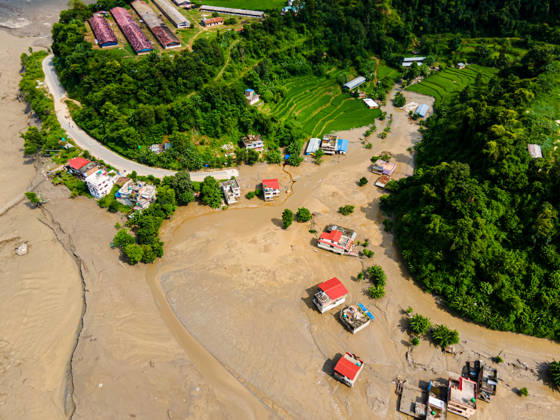 Aerial View Shows Extensive Damage After Flash Flood Sweeps Through The Bhotekoshi River In Nuwakot Aerial view shows flood-damaged areas after a flash flood swept through the Bhotekoshi River in Nuwakot, Nepal, on August 26, 2026. The flooding caused widespread damage to homes, roads, bridges and other infrastructure in the area, while many people remain missing; the figures are still developing Nuwakot bagmati Nepal  Copyright: xAmbirxTolangx originalFilename: tolang-aerialvi260826_npeaP.jpg