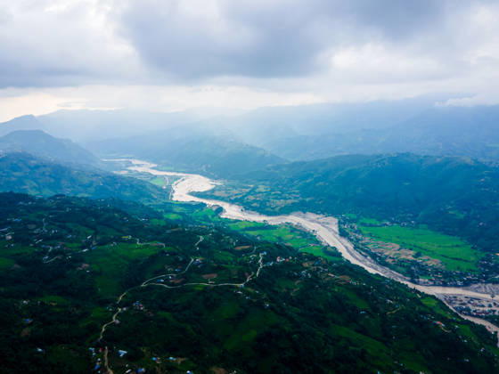 Aerial View Shows Extensive Damage After Flash Flood Sweeps Through The Bhotekoshi River In Nuwakot Aerial view shows flood-damaged areas after a flash flood swept through the Bhotekoshi River in Nuwakot, Nepal, on August 26, 2026. The flooding caused widespread damage to homes, roads, bridges and other infrastructure in the area, while many people remain missing; the figures are still developing Nuwakot bagmati Nepal  Copyright: xAmbirxTolangx originalFilename: tolang-aerialvi260826_nphuS.jpg