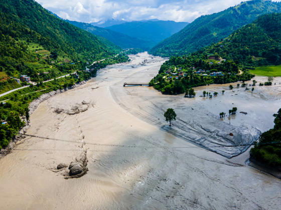 Aerial View Shows Extensive Damage After Flash Flood Sweeps Through The Bhotekoshi River In Nuwakot Aerial view shows flood-damaged areas after a flash flood swept through the Bhotekoshi River in Nuwakot, Nepal, on August 26, 2026. The flooding caused widespread damage to homes, roads, bridges and other infrastructure in the area, while many people remain missing; the figures are still developing Nuwakot bagmati Nepal  Copyright: xAmbirxTolangx originalFilename: tolang-aerialvi260826_npJYa.jpg