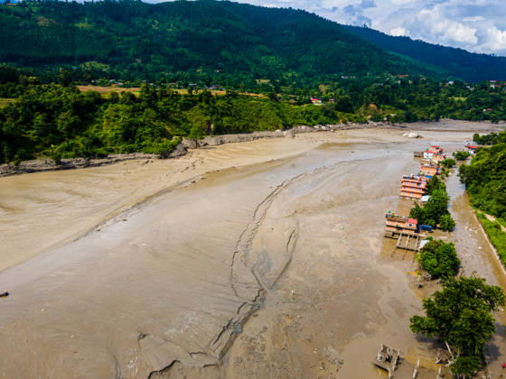 Aerial View Shows Extensive Damage After Flash Flood Sweeps Through The Bhotekoshi River In Nuwakot Aerial view shows flood-damaged areas after a flash flood swept through the Bhotekoshi River in Nuwakot, Nepal, on August 26, 2026. The flooding caused widespread damage to homes, roads, bridges and other infrastructure in the area, while many people remain missing; the figures are still developing Nuwakot bagmati Nepal  Copyright: xAmbirxTolangx originalFilename: tolang-aerialvi260826_nptkn.jpg