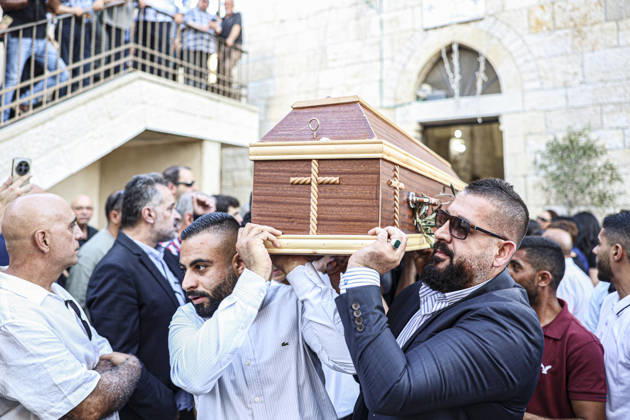 Palestinians Mourn Artist Sliman Mansour Pallbearers carry the coffin of renowned Palestinian artist Sliman Mansour during his funeral procession in Birzeit, north of Ramallah, in the occupied West Bank, on August 26, 2026. Mansour, one of the most prominent figures in contemporary Palestinian visual art, died on August 24 at the age of 79 and was known for works depicting Palestinian landscapes, heritage and life under Israeli occupation, including his 1973 painting Camel of Hardships. Ramallah West Bank Palestinian Territories Copyright: xMohammadxNazzalx