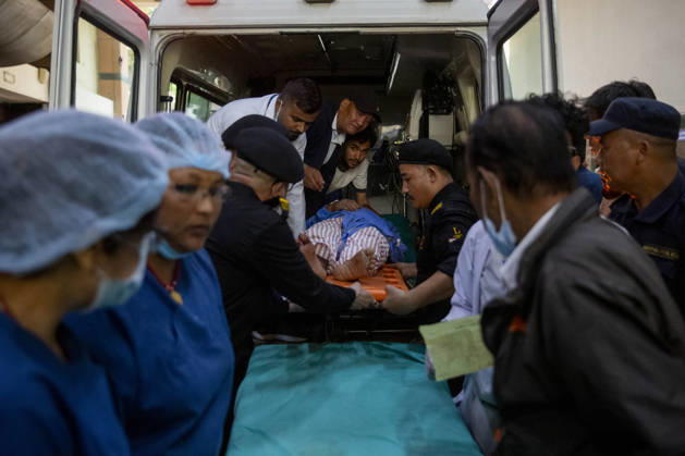 (260827) -- BEIJING, Aug. 27, 2026 -- A person injured in a massive flash flood in north Nepal is taken to a hospital in Kathmandu, Nepal, Aug. 26, 2026. The death toll from flash floods in northern Nepal has reached 157, police said Wednesday night. (Photo by Xinhua) XINHUA PHOTOS OF THE DAY SulavxShrestha 