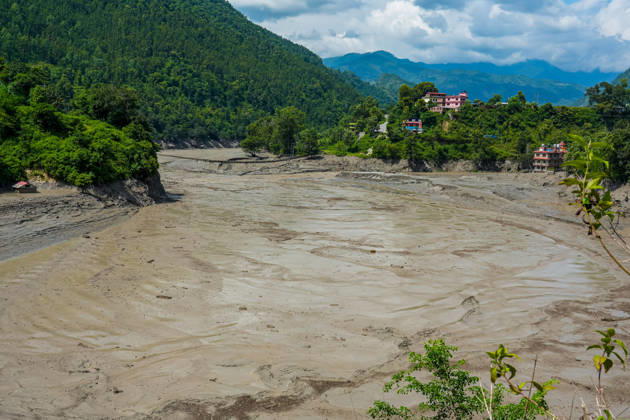 Bhotekoshi Floods Damage Homes and Infrastructure in Nuwakot Nepal Kathmandu, Nepal - August 26, 2026: Flooding in the Bhotekoshi River has affected low-lying areas along the riverbanks and nearby residences in Nuwakot, Nepal. The flooding caused widespread damage to homes, roads, bridges, and other infrastructure in the area, while several people remain missing and the number of casualties is still being assessed. (Photo by AP Tolang Nexpher Images) Nuwakot bagmati