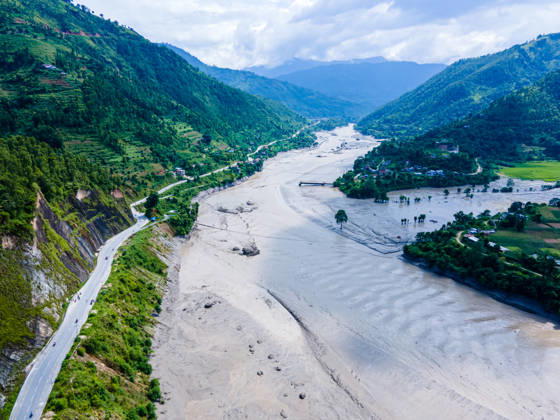 Drone View Shows Bhotekoshi Flood Damage to Homes and Infrastructure in Nuwakot Nepal Nuwakot, Nepal - August 26, 2026: Aerial view shows flooding along the Bhotekoshi River affecting low-lying areas along the riverbanks and nearby residences in Nuwakot, Nepal. The flooding has caused widespread damage to homes, roads, bridges, and other infrastructure in the area, while several people remain missing and the number of casualties is still being assessed. (Photo by AP Tolang Nexpher Images) Nuwakot bagmati