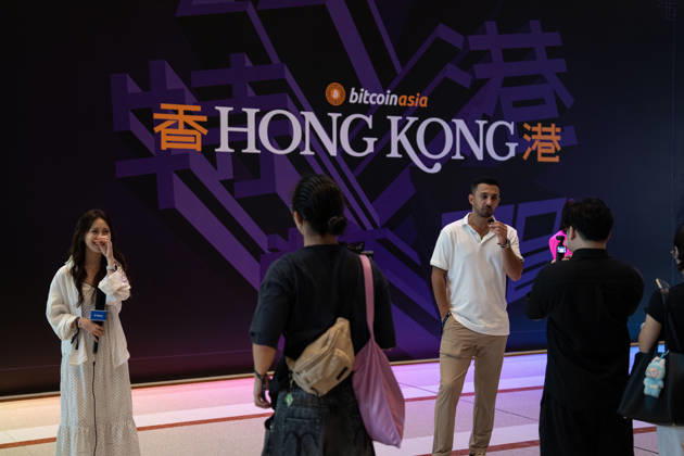 Bitcoin Asia Hong Kong 2026 People in front of a large board at the entrance to Bitcoin Asia 2026 on August 27, 2026 in Hong Kong. (Photo by Vernon Yuen Nexpher Images) HONG KONG
