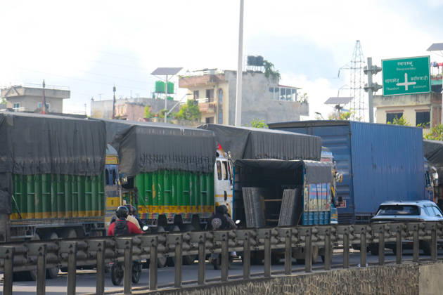 August 27, 2026, Kathmandu, Bagmati, Nepal: Trucks and other vehicles remain stranded along the Kalankiâ€Thankotâ€Nagdhunga route in Kathmandu, Nepal, on August 27, 2026, as major highways remain closed following devastating flash floods and landslides. The stranded vehicles have occupied multiple lanes along the road, causing traffic congestion and further disrupting movement in the area. The floods swept through Rasuwa and other parts of central Nepal before surging downstream along the Trishuli and Narayani river systems, damaging roads, bridges, settlements and other infrastructure. The Nagdhungaâ€Muglin route, a key road connection between Kathmandu and other parts of the country, has been closed, disrupting the movem - ZUMAs330 20260827_zsp_s330_002 Copyright: xSafalxPrakashxShresthax