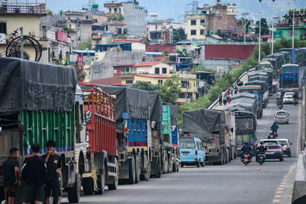 August 27, 2026, Kathmandu, Bagmati, Nepal: Trucks and other vehicles remain stranded along the Kalankiâ€Thankotâ€Nagdhunga route in Kathmandu, Nepal, on August 27, 2026, as major highways remain closed following devastating flash floods and landslides. The stranded vehicles have occupied multiple lanes along the road, causing traffic congestion and further disrupting movement in the area. The floods swept through Rasuwa and other parts of central Nepal before surging downstream along the Trishuli and Narayani river systems, damaging roads, bridges, settlements and other infrastructure. The Nagdhungaâ€Muglin route, a key road connection between Kathmandu and other parts of the country, has been closed, disrupting the movem - ZUMAs330 20260827_zsp_s330_016 Copyright: xSafalxPrakashxShresthax
