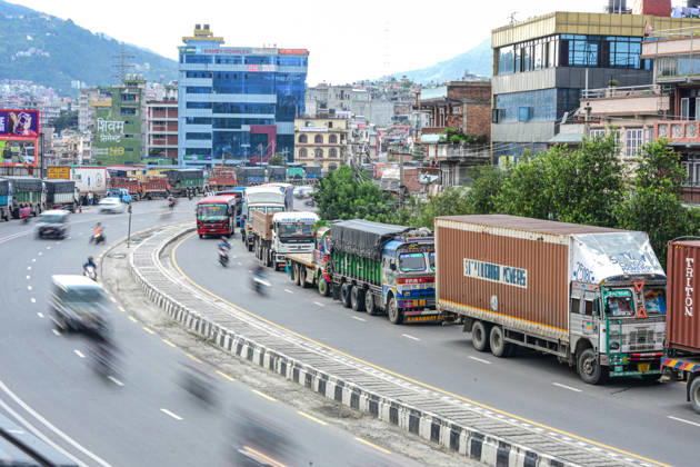 August 27, 2026, Kathmandu, Bagmati, Nepal: Trucks and other vehicles remain stranded along the Kalankiâ€Thankotâ€Nagdhunga route in Kathmandu, Nepal, on August 27, 2026, as major highways remain closed following devastating flash floods and landslides. The stranded vehicles have occupied multiple lanes along the road, causing traffic congestion and further disrupting movement in the area. The floods swept through Rasuwa and other parts of central Nepal before surging downstream along the Trishuli and Narayani river systems, damaging roads, bridges, settlements and other infrastructure. The Nagdhungaâ€Muglin route, a key road connection between Kathmandu and other parts of the country, has been closed, disrupting the movem - ZUMAs330 20260827_zsp_s330_036 Copyright: xSafalxPrakashxShresthax