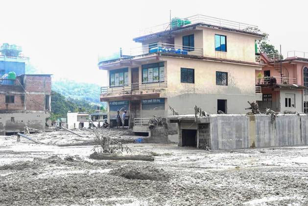 August 27, 2026, Nuwakot, Nepal: NUWAKOT, NEPAL, AUGUST 26, 2026: Houses and other structures in Trishuli Devighat Bazaar, Nuwakot, are seen damaged following flooding in the Bhotekoshi River in Rasuwa. Nuwakot Nepal  - ZUMAq101 20260827_zna_q101_010 Copyright: xGopalxDahalx