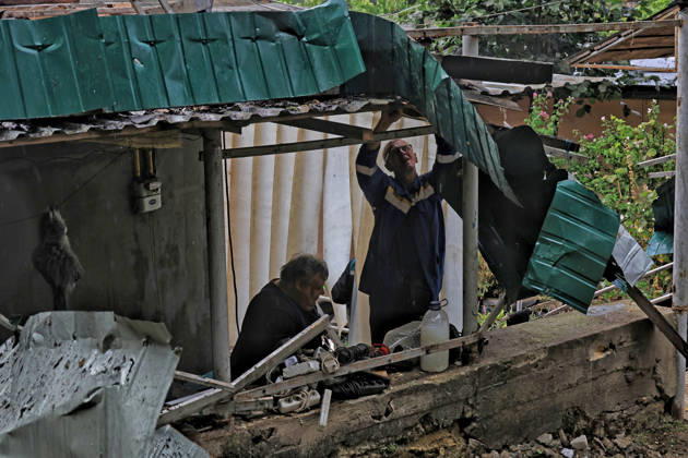 A man and a woman stand among the rubble after a Russian attack in the Prymorskyi district of Odesa, Ukraine, August 27, 2026. On the night and morning of August 27, the Russian Federation attacked Odesa. The Russian army massively attacked Odesa with missiles and drones. The Russian strikes damaged infrastructure, an academic institution, and a multi-storey building. (Photo by Nina Liashonok Ukrinform) Odesa hit by overnight and daytime Russian strikes  Copyright: xNinaxLiashonokx