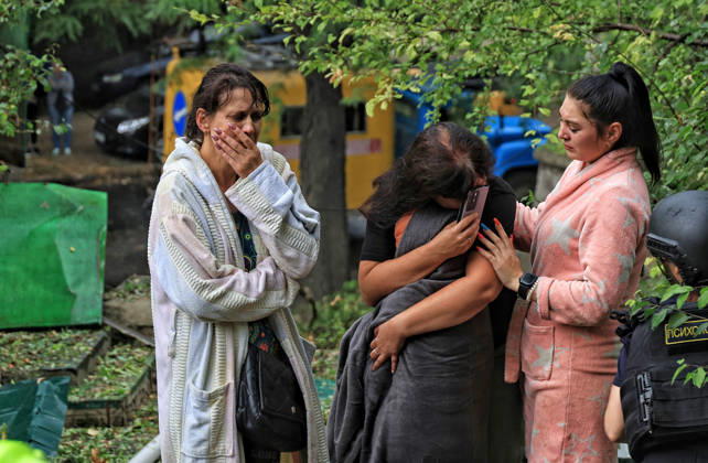 Women cry in the street after a Russian attack in the Prymorskyi district of Odesa, Ukraine, August 27, 2026. On the night and morning of August 27, the Russian Federation attacked Odesa. The Russian army massively attacked Odesa with missiles and drones. The Russian strikes damaged infrastructure, an academic institution, and a multi-storey building. (Photo by Nina Liashonok Ukrinform) Odesa hit by overnight and daytime Russian strikes  Copyright: xNinaxLiashonokx