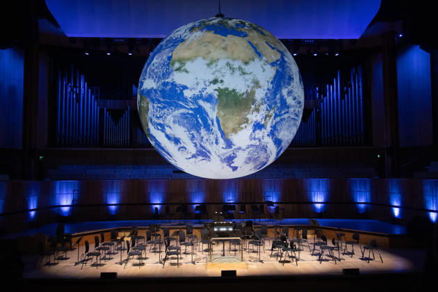 Luke Jerram s Earth Installation GAIA Suspended over Royal Festival Hall Stage at Royal Festival Hall, London, UK - Thursday 27 August 2026 A General view of GAIA by Luke Jerram at Royal Festival Hall, London, England, UK on Thursday 27 August, 2026. The Installation runs from Friday 28th August - 30th August 2026 and Orchestral performances from the BBC Concert Orchestra will take place on Friday 28th and Saturday 29th August 2026., Credit:Justin Ng Avalon UK, England, London, Royal Festival Hall Copyright: xJustinxNgx xAvalonx 1128810172