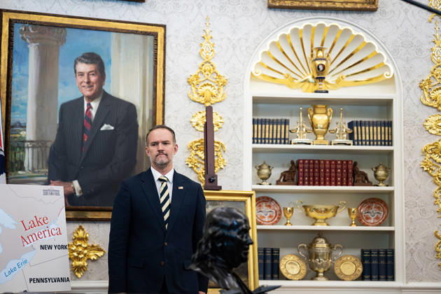 Jamieson Greer, US trade representative, stands next to a portrait of former President Ronald Reagan, as President Donald Trump, not pictured, signs an executive order to rename Lake Ontario as Lake America, amid a recent trade war with Canada, in the Oval Office of the White House in Washington, DC on Thursday, August 27, 2026. WASP20260827112 AlxDrago