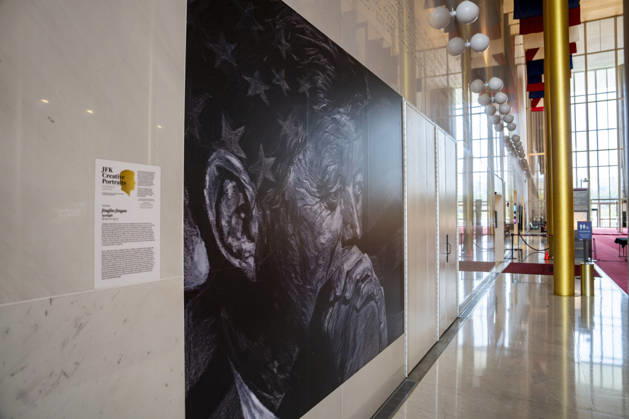 A photo of former President John F. Kennedy is seen inside The Hall of States in The John F. Kennedy Center for Performing Arts in Washington, DC on Thursday, August 27. 2026. In a court ruling filed earlier this week, the Trump Administration said they may demolish the center if proposed renovation plans are blocked.  WAP20260827316 BONNIExCASH