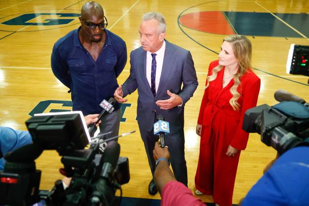 August 27, 2026, Tampa, Florida, USA: From left to right, Thaddeus Bullard, a WWE Hall of Famer, U.S. Secretary of Health and Human Services Robert F. Kennedy, Jr., and Rep. Laurel Lee, R-Tampa, speak to reporters during the Presidential Fitness Test event at Gaither High School on Thursday, Aug. 27, 2026, in Tampa. Tampa USA - ZUMAs70_ 20260827_zan_s70_015 Copyright: xJeffereexWoox