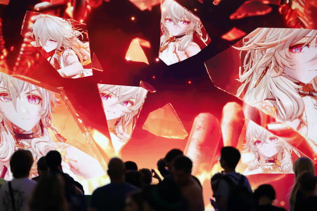 Besucher vor einer wandhohen Werbung für ein Computerspiel auf der weltgrößten Computerspielmesse Gamescom 26 in der Koelnmesse. (Themenbild, Symbolbild) Köln, 27.08.2026 NRW Deutschland Copyright: xChristophxHardtx