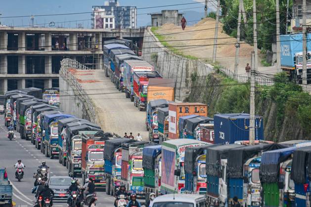 August 27, 2026, Kathmandu, Bagmati, Nepal: KATHMANDU, NEPAL, AUGUST 27, 2026: Trucks and other vehicles remain stranded along the Kalankiâ€Thankotâ€Nagdhunga route in Kathmandu as major highways remain closed following flash floods and landslides in parts of Nepal. The stranded vehicles occupy multiple lanes, causing severe traffic congestion and disrupting the movement of people and goods. The floods and landslides damaged roads, bridges, settlements and other infrastructure, while the closure of the Nagdhungaâ€Muglin route has disrupted a key road connection between Kathmandu and other parts of the country. Kathmandu Nepal - ZUMAq101 20260827_zna_q101_059 Copyright: xSafalxPrakashxShresthax