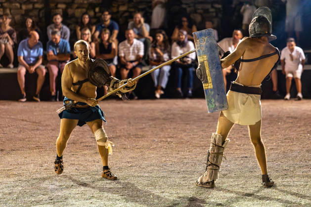 Gladiator fights in Pula, Croatia Members of gladiator school Spectacvla Gladiatoria dressed as Roman gladiators perform a staged combat demonstration during the event Spectacvla Antiqva at the Arena of Pula on August 27, 2026. in Pula, Croatia.  SreckoxNiketic PIXSELL