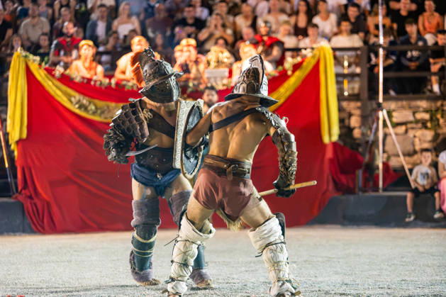Gladiator fights in Pula, Croatia Members of gladiator school Spectacvla Gladiatoria dressed as Roman gladiators perform a staged combat demonstration during the event Spectacvla Antiqva at the Arena of Pula on August 27, 2026. in Pula, Croatia.  SreckoxNiketic PIXSELL