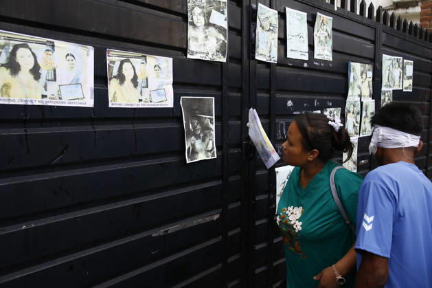 Aftermath of floods in Kathmandu, Nepal - 28 Aug 2026 Photographs of missing people seen displayed outside the hospital as families await information about their loved ones with recovered bodies being kept for identification and post-mortem examinations at Tribhuvan University Teaching Hospital. The flooding destroyed roads, bridges and severely disrupted the movement of people and goods across the country. Police said 469 people have been killed and hundreds remain missing as search and rescue operations continue. Kathmandu Nepal Copyright: xSkandaxGautamx xSOPAxImagesx _58W0700