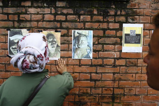 Aftermath of floods in Kathmandu, Nepal - 28 Aug 2026 Photographs of missing people seen displayed outside the hospital as families await information about their loved ones with recovered bodies being kept for identification and post-mortem examinations at Tribhuvan University Teaching Hospital. The flooding destroyed roads, bridges and severely disrupted the movement of people and goods across the country. Police said 469 people have been killed and hundreds remain missing as search and rescue operations continue. Kathmandu Nepal Copyright: xSkandaxGautamx xSOPAxImagesx _58W0726