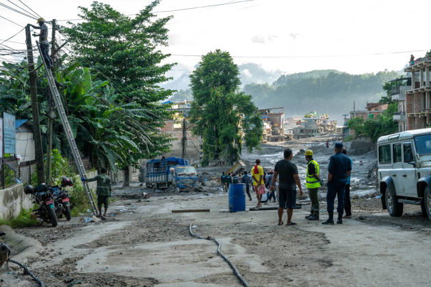 Nepal flash floods death toll rises to 538, over 1,200 missing BIDUR, NEPAL - AUGUST 28: Emergency teams continue search and rescue operations in the region while local residents anxiously wait for news of their missing relatives at the Trishuli River corridor following a catastrophic outburst flood and debris flow in Bidur, Nuwakot district, Nepal, on August 28, 2026. Triggered by a massive ice and rock collapse along the Nepal-China (Tibet) border into the Lhende Khola and Bhote Koshi river system, the sudden surge swept through downstream settlements, destroying roads, bridges, power plants, and critical infrastructure. As of August 28, official reports indicate that the death toll in Nepal has climbed to 538, with around 1,200 people—in Copyright: x2026xAnadoluxSameerxShresthax