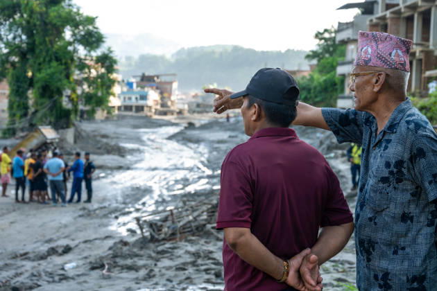 Nepal flash floods death toll rises to 538, over 1,200 missing BIDUR, NEPAL - AUGUST 28: Emergency teams continue search and rescue operations in the region while local residents anxiously wait for news of their missing relatives at the Trishuli River corridor following a catastrophic outburst flood and debris flow in Bidur, Nuwakot district, Nepal, on August 28, 2026. Triggered by a massive ice and rock collapse along the Nepal-China (Tibet) border into the Lhende Khola and Bhote Koshi river system, the sudden surge swept through downstream settlements, destroying roads, bridges, power plants, and critical infrastructure. As of August 28, official reports indicate that the death toll in Nepal has climbed to 538, with around 1,200 people—in Copyright: x2026xAnadoluxSameerxShresthax
