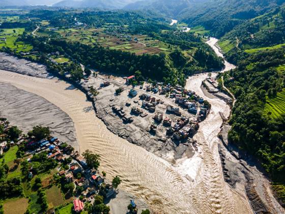 August 28, 2026, Nuwakot, Bagmati, Nepal: NUWAKOT, NEPAL †AUGUST 28, 2026: An aerial view shows the aftermath of severe flooding along the Bhotekoshi River in Nuwakot, Nepal. The flooding affected low-lying areas and settlements near the riverbanks, causing widespread damage to homes, roads, bridges, a hydropower station and other infrastructure. Several people remain missing as authorities continue to assess the extent of the disaster. Rescue teams and security personnel are conducting search and rescue operations in the affected areas. Nuwakot Nepal - ZUMAq101 20260828_zna_q101_126 Copyright: xAmbirxTolangx