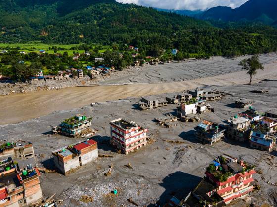 August 28, 2026, Nuwakot, Bagmati, Nepal: NUWAKOT, NEPAL †AUGUST 28, 2026: An aerial view shows the aftermath of severe flooding along the Bhotekoshi River in Nuwakot, Nepal. The flooding affected low-lying areas and settlements near the riverbanks, causing widespread damage to homes, roads, bridges, a hydropower station and other infrastructure. Several people remain missing as authorities continue to assess the extent of the disaster. Rescue teams and security personnel are conducting search and rescue operations in the affected areas. Nuwakot Nepal - ZUMAq101 20260828_zna_q101_131 Copyright: xAmbirxTolangx