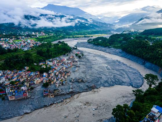 August 28, 2026, Nuwakot, Bagmati, Nepal: NUWAKOT, NEPAL †AUGUST 28, 2026: An aerial view shows the aftermath of severe flooding along the Bhotekoshi River in Nuwakot, Nepal. The flooding affected low-lying areas and settlements near the riverbanks, causing widespread damage to homes, roads, bridges, a hydropower station and other infrastructure. Several people remain missing as authorities continue to assess the extent of the disaster. Rescue teams and security personnel are conducting search and rescue operations in the affected areas. Nuwakot Nepal - ZUMAq101 20260828_zna_q101_127 Copyright: xAmbirxTolangx
