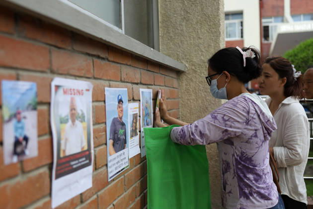 Rasuwa Floods Leave Hundreds Missing As Search For Victims Continues A family member displays a photograph of a missing relative at Tribhuvan University Teaching Hospital in Kathmandu, Nepal, on August 28, 2026. Families of people missing after floods and landslides in Rasuwa have come to the hospital seeking information about their loved ones. Kathmandu Nepal  Copyright: xSubaasxShresthax originalFilename: shrestha-notitle260828_npcU6.jpg