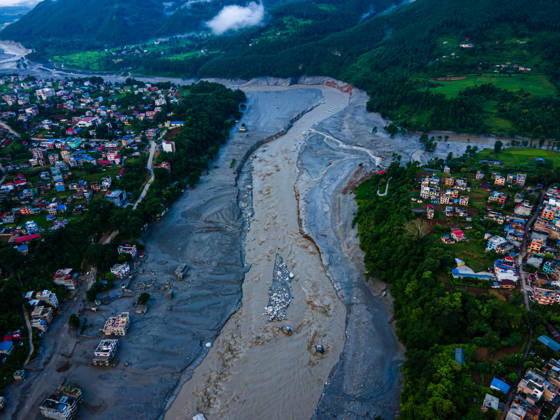 Aerial View Shows Massive Flood Devastation Along The Bhotekoshi River, Nuwakot An aerial view shows the aftermath of flooding along the Bhotekoshi River, which affected low-lying areas and settlements near the riverbanks in Nuwakot, Nepal, on August 28, 2026. The flooding caused widespread damage to homes, roads, a bridge, a hydropower station and other infrastructure in the area. Several people remain missing as the number of casualties continues to develop. Rescue teams and security personnel are carrying out search and rescue operations in the affected areas. Nuwakot bagmati Nepal  Copyright: xAmbirxTolangx originalFilename: tolang-aerialvi260828_npVB8.jpg