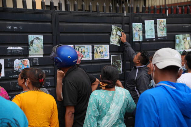 Families Seek Missing Relatives After Devastating Mudslide - Nepal People look at photographs of individuals who died in the devastating flash floods in Nepal, displayed outside Tribhuvan University Teaching Hospital in Kathmandu, Nepal on August 28, 2026. Photo by Sunil Pradhan ABACAPRESS.COM Kathmandu Bagmati Nepal  Copyright: xSuniixPradhan ABACAx