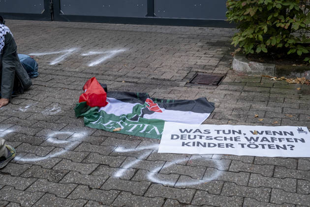 Protest against Rheinmetall in Germany BONN, GERMANY - AUGUST 28: Activists block the entrance to a Rheinmetall facility during a protest against the German arms manufacturer in Bonn, Germany, on August 28, 2026. Demonstrators staged the blockade as part of a nationwide mobilization protesting Rheinmetall’s involvement in the defense industry and its supply of military equipment amid the war in Gaza. Several participants glued themselves to the ground, prompting police to deploy a technical unit during a six-hour operation that ended with the arrest and detention of all blockade participants. Mouafak Mahmalji Anadolu Bonn Germany. Editorial use only. Please get in touch for any other usage.  Copyright: x2026xAnadoluxMouafakxMahmaljix