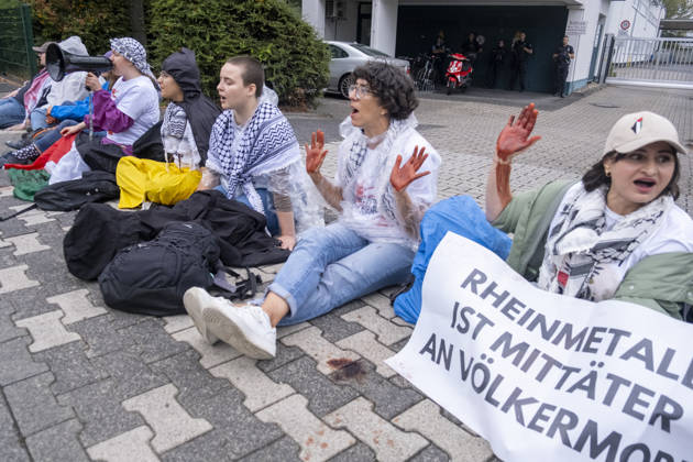Protest against Rheinmetall in Germany BONN, GERMANY - AUGUST 28: Activists block the entrance to a Rheinmetall facility during a protest against the German arms manufacturer in Bonn, Germany, on August 28, 2026. Demonstrators staged the blockade as part of a nationwide mobilization protesting Rheinmetall’s involvement in the defense industry and its supply of military equipment amid the war in Gaza. Several participants glued themselves to the ground, prompting police to deploy a technical unit during a six-hour operation that ended with the arrest and detention of all blockade participants. Mouafak Mahmalji Anadolu Bonn Germany. Editorial use only. Please get in touch for any other usage.  Copyright: x2026xAnadoluxMouafakxMahmaljix