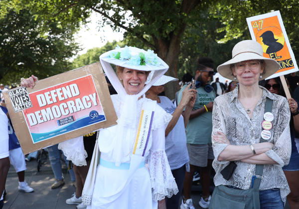 August 28, 2026, Washington, District Of Columbia, USA: People hold signs as they attend a Defend the Vote rally near the Lincoln Memorial in Washington, DC, USA, on August 28, 2026, coinciding with the 63rd anniversary of the 1963 March on Washington rally for civil rights. The march comes just weeks before the November midterm elections, with organisers using the demonstration to mobilise voters and make voting rights a central issue in the campaign. Washington USA - ZUMAs337 20260828_znp_s337_011 Copyright: xGentxShkullakux