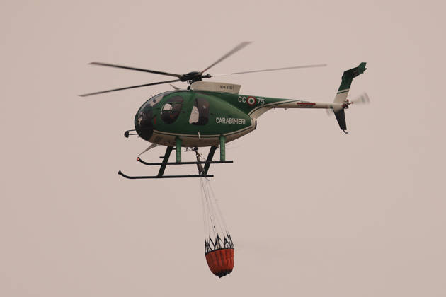 Wildfire suppression efforts continue on Italy s Sicily and Sardinia islands PALERMO, ITALY - AUGUST 28: Firefighting teams and forestry workers respond to tackle a wildfire from the ground with water tankers, while the gendarmerie intervened from the air with a helicopter, in Pianetto, near Palermo, Italy on August 28, 2026. Alberto Lo Bianco Anadolu Palermo Italy. Editorial use only. Please get in touch for any other usage.  Copyright: x2026xAnadoluxAlbertoxLoxBiancox
