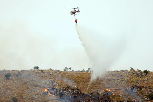 Wildfire suppression efforts continue on Italy s Sicily and Sardinia islands PALERMO, ITALY - AUGUST 28: Firefighting teams and forestry workers respond to tackle a wildfire from the ground with water tankers, while the gendarmerie intervened from the air with a helicopter, in Pianetto, near Palermo, Italy on August 28, 2026. Alberto Lo Bianco Anadolu Palermo Italy. Editorial use only. Please get in touch for any other usage.  Copyright: x2026xAnadoluxAlbertoxLoxBiancox