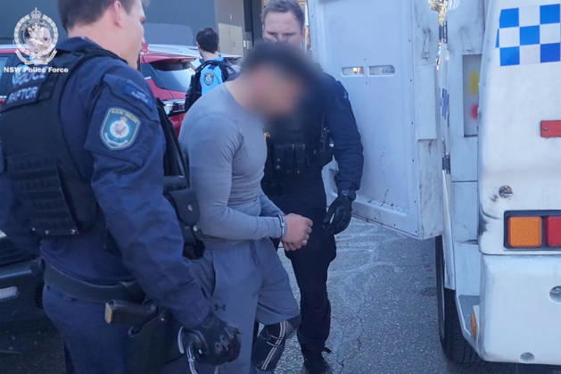AUBURN KEBAB SHOP SHOOTING ARREST, In a supplied image, NSW Police arrest arrest a 31-year-old man in Narwee NSW on Friday, 28th August, 2026. Taskforce Falcon detectives have charged an alleged gunman over a shooting at a kebab shop in Sydney™s west last year. (PR HANDOUT Supplied by New South Wales Police Force) NO ARCHIVING, EDITORIAL USE ONLY, AAP PROVIDES ACCESS TO THIS HANDOUT IMAGE TO BE USED SOLELY FOR THE PURPOSE FOR WHICH THE IMAGE WAS PROVIDED - FOR REPORTING ON THE EVENTS OR FACTS DEPICTED IN THE IMAGE NO ARCHIVING, EDITORIAL USE ONLY, AAP PROVIDES ACCESS TO THIS HANDOUT IMAGE TO BE USED SOLELY FOR THE PURPOSE FOR WHICH THE IMAGE WAS PROVIDED - FOR REPORTING ON THE EVENTS OR FACTS DEPICTED IN THE IMAGE. UNKNOWN NEW SOUTH WALE  Copyright: xPRxIMAGEx 20260829163571974446