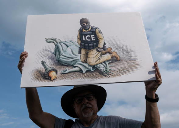 August 28, 2026, Washington, Distict Of Columbia, U.S.A: A demonstrator holds an anti-ICE sign while attending the â€oeMarch on Washington: Defend the Vote†rally at the Lincoln Memorial in Washington, DC, on August 28, 2026. The rally, organized by the National Action Network, marks the 63rd anniversary of the 1963 March on Washington, where Rev. Martin Luther King Jr. delivered his historic â€oeI Have a Dream†speech. Thousands of demonstrators are expected to gather to call attention to voting rights ahead of Novemberâ€⠢s midterm elections. Washington U.S.A - ZUMAr125 20260828_fap_r125_009 Copyright: xProbalxRashidx