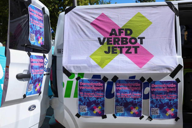August 29, 2026, Halle, Saxony-Anhalt, Germany: A vehicle displays a banner reading Ã¢â‚¬oeAfD VERBOT JETZTÃ¢â‚¬Â (Ã¢â‚¬oeBan the AfD nowÃ¢â‚¬Â) and posters for a demonstration under the slogan Ã¢â‚¬oeDemokratie verteidigen!Ã¢â‚¬Â (Ã¢â‚¬oeDefend democracy!Ã¢â‚¬Â) in Halle, Saxony-Anhalt, Germany. The demonstration is being held against the far-right Alternative for Germany (AfD) party amid the state election campaign. Halle Germany  - ZUMAc291 20260829_zip_c291_001 Copyright: xMariaxCastrox