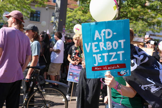 August 29, 2026, Halle, Saxony-Anhalt, Germany: Around 1,500 people attend a demonstration against the far-right Alternative for Germany (AfD) party in Halle, Saxony-Anhalt, Germany, amid the state election campaign. A demonstrator holds a sign reading Ã¢â‚¬oeBan the AfD. Anything is possible. Halle Germany  - ZUMAc291 20260829_zip_c291_008 Copyright: xMariaxCastrox