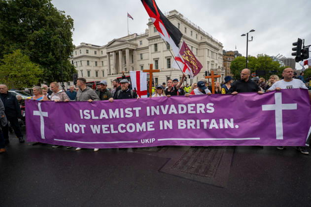 August 29, 2026, London, Westminster, United Kingdom: Protestors hold a banner during the No to Sharia Law protest in central London. UKIP leader Nick Tenconi led supporters on a march and rally through central London calling for an end to Sharia law in Great Britain. The demonstration, organized under the banner No to Sharia Law, was met by a counter-protest. Tensions rose at the start of the march, with counter-protesters pushing against police officers as officers attempted to keep the opposing groups apart. The Metropolitan Police had imposed conditions on both demonstrations to prevent serious disorder. London United Kingdom  - ZUMAs197 20260829_aaa_s197_177 Copyright: xJamesxWilloughbyx