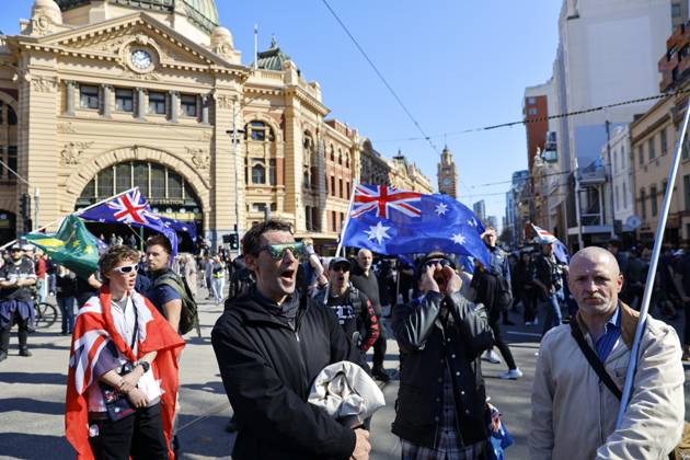 August 30, 2026, Melbourne, Victoria State, Australia: Far-right activists chant slogans during a far right March for Australia anti-immigration rally..Hundreds of supporters of the far-right group March for Australia marched through Melbourneâ€⠢s CBD as part of a demonstration focused on freedom of speech and political expression, while counter-protesters gathered separately to oppose the march and its political messages. March for Australia organisers called for the repeal of laws they say restrict political communication, an end to government censorship and constitutional protection for freedom of speech. Melbourne Australia - ZUMAs197 20260830_aaa_s197_031 Copyright: xYexMyoxKhantx
